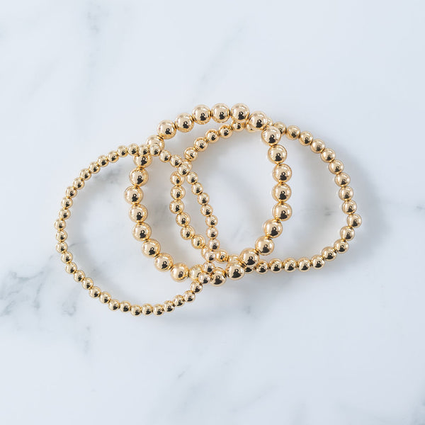 Triple Gold Bracelets