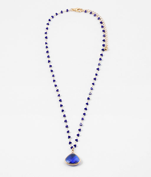 Dainty blue bead necklace with large blue stone teardrop pendant