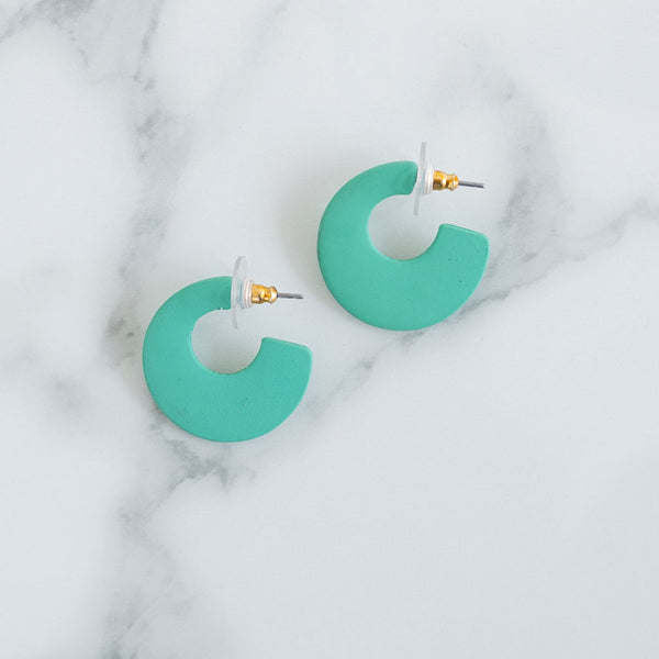 Picture of mint green chunky hoop earrings.