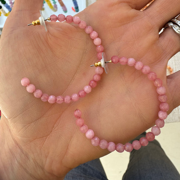 Large pink beaded hoop earrings