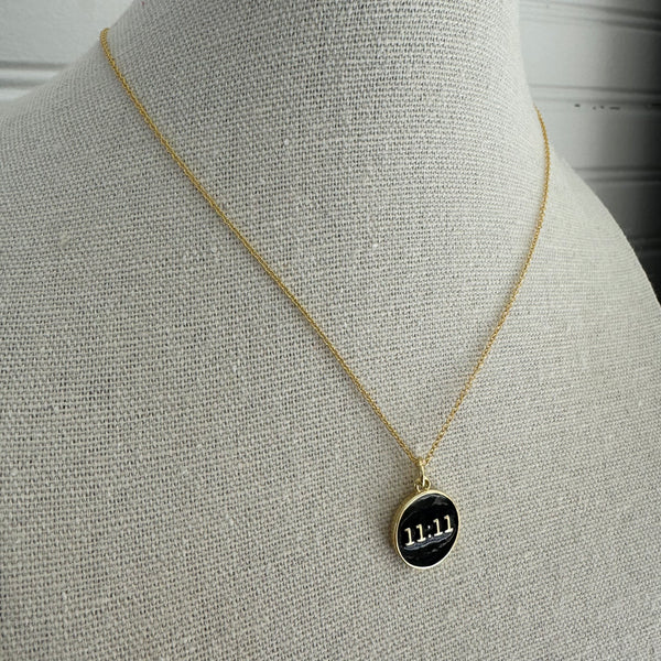 11:11 Good Luck gold and black disc necklace