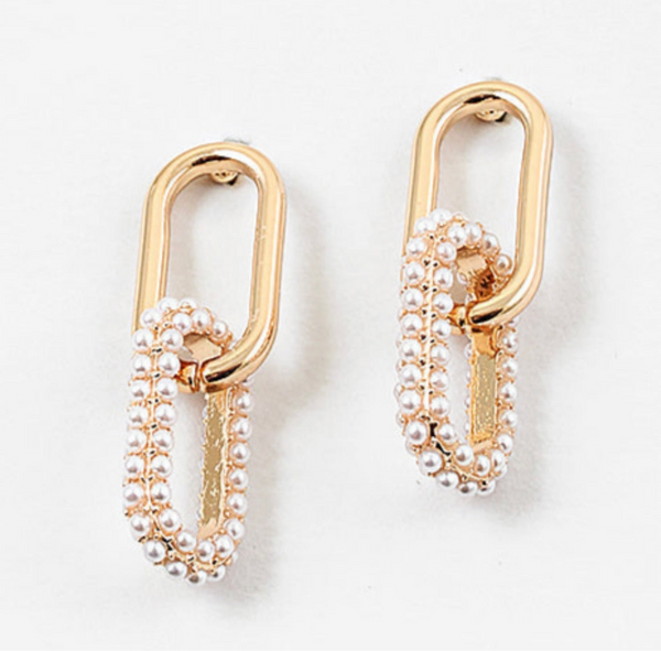 Set of gold chain link earrings. The bottom link is studded in pearls