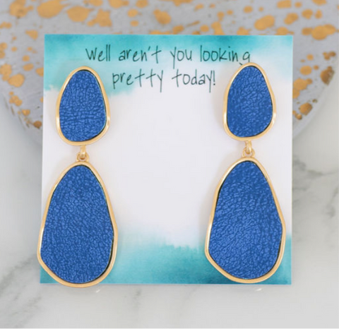 Large gold and blue dangle druzy earrings.