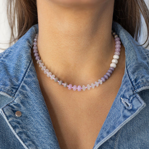 Model wearing short purple ombre beaded necklace